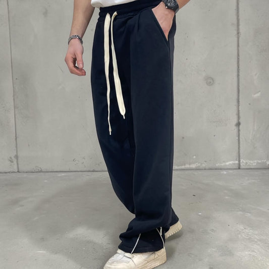 Panta tuta flared con zip